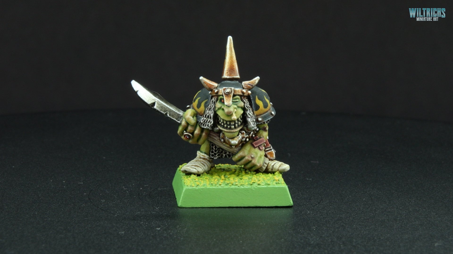 Night Goblin Champion miniature painted by Wiltrichs – 28mm display model on Goblin Green base, Olden Demon 2025 entry